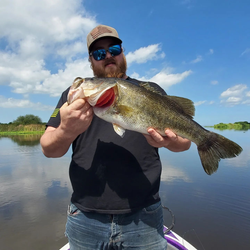 Angler reeling in a 23-inch fish in FL