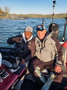 Two people enjoying a fishing adventure in FL