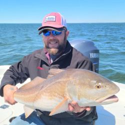 Angler with a 21-inch fish in Panacea