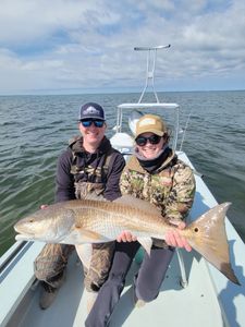 Two people fishing in Panacea