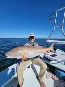 Person fishing in Panacea