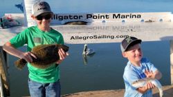 Two people fishing in Panacea