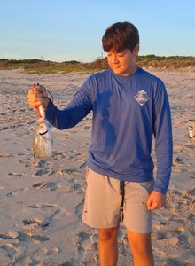 A person fishing in FL