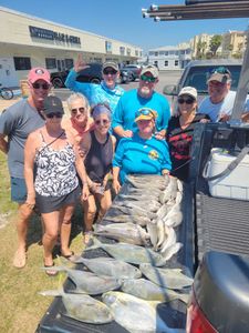Successful fishing trip in Melbourne FL with large catch of Florida Pompano and other fish displayed in truck bed