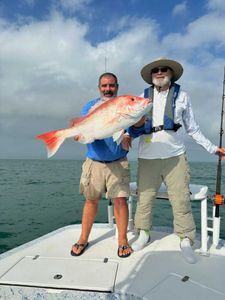 Angler's delight: Redfish frenzy on deck!