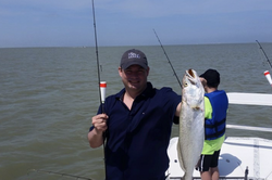 A person fishing in TX