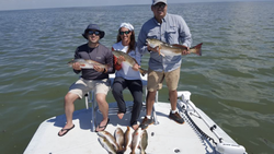 2 fishing rod with people in texas