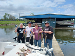 5 people fishing in Willis