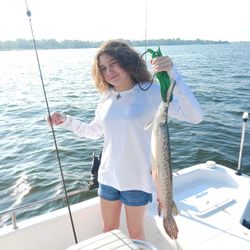 Angler with a mighty alligator gar in TX