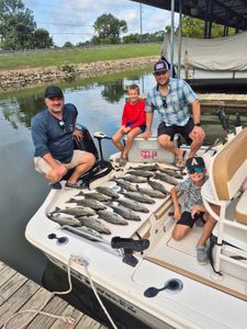 Four people fishing in TX