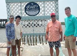 Eight speckled trout displayed on cleaning station at Bluff's Landing Marina in Corpus Christi TX