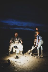Three people enjoying fishing on Peter Iredale Rd
