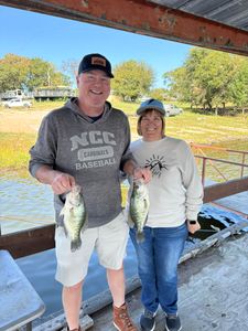 Two white crappie fish caught while fishing in Adair