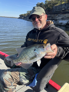 Nice white crappie using light tackle jigging techniques!