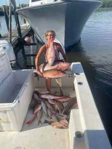 A person fishing with a rod in FL