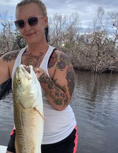 A person fishing at Fort Myers Beach