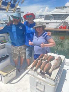 3 people fishing at Fort Myers Beach