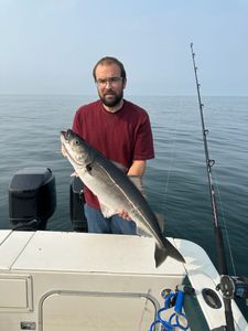 A lone fisherman in Maine catches a 22-inch fish
