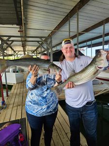 Two striped bass caught by two anglers in Pottsboro