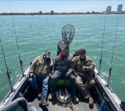 Three people fishing in Detroit