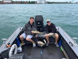 Two people fishing in MI