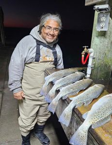 Angler fishing in Texas with 2 fish