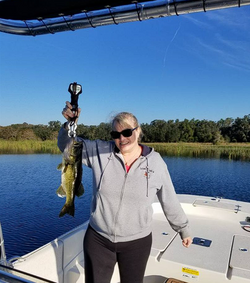 Angler with a 14-inch fish at Kissimmee
