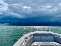 Scenic view of shoreline in FL with fishing rods and tackle