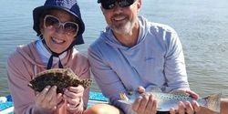 Two anglers with fishing rods on Johns Island