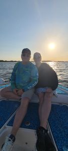 Two people enjoying a fishing tour on Johns Island