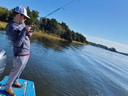 A person enjoying a fishing tour on Johns Island