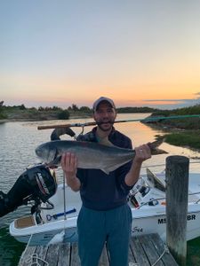 Single fisherman in Massachusetts enjoying a great day of fishing