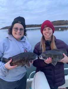 3 people fishing on a river in MA