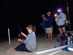 Four people enjoying a fishing trip in Cape May