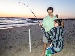Three anglers enjoying a fishing trip in Cape May