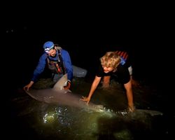 Two people enjoying a fishing trip in Cape May