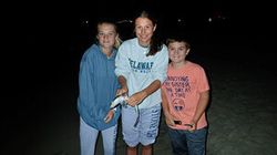 Three people fishing at Cape May