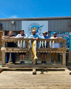 5 people fishing in Texas with 2 big fish