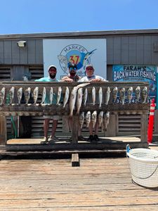 Three people fishing in Corpus Christi