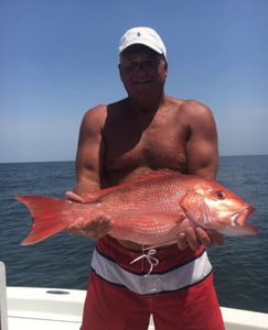 Fisherman angling in Alabama with fishing gear