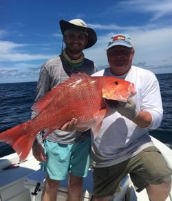 Two people fishing in Gulf Shores