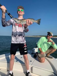 Two people fishing in Gulf Shores