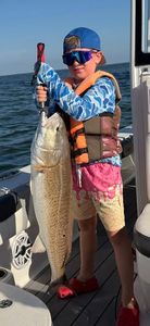 Large redfish caught during fishing trip in Gulf Shores Alabama