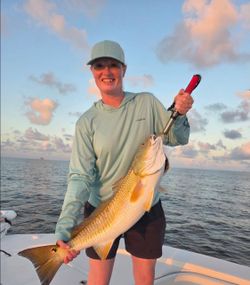 Large redfish caught during fishing trip in Gulf Shores Alabama