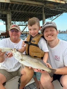 Speckled trout catch displayed on fishing charter boat in Gulf Shores AL