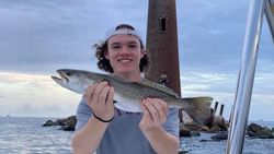 A photo of a 20-inch Spotted Weakfish caught while fishing in Gulf Shores