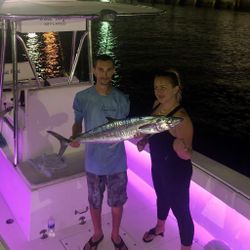 Two people fishing in Pompano Beach, cruises and fishing type