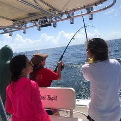Three people on a fishing cruise in Florida