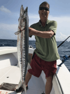 Person fishing at Pompano Beach