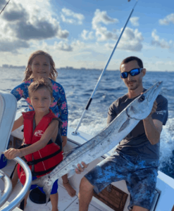 3 people fishing at Pompano Beach